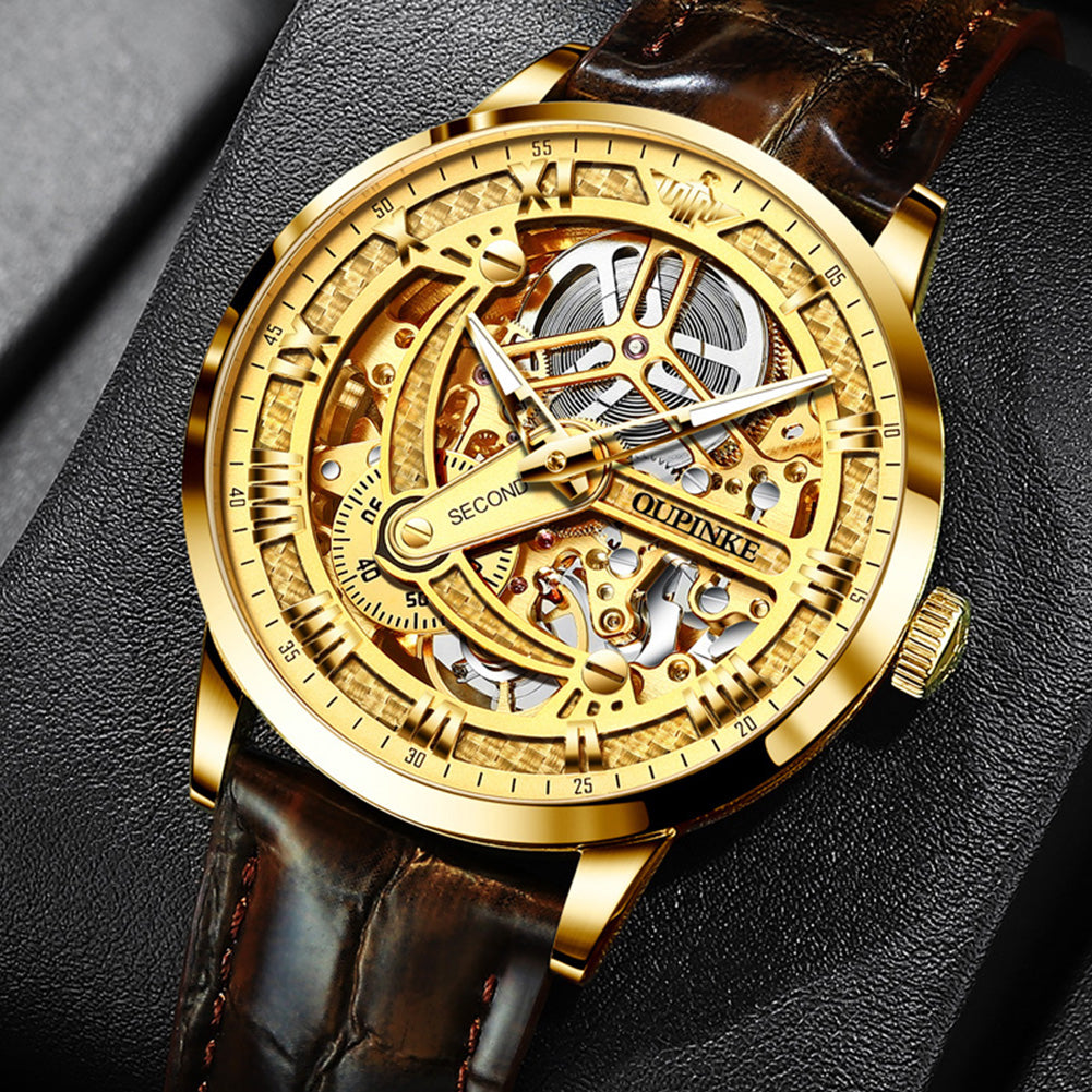 OUPINKE 3173 gold skeleton automatic watch showing open worked mechanical movement