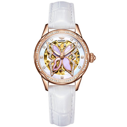 Luxury watch with butterfly design and white strap on a white background