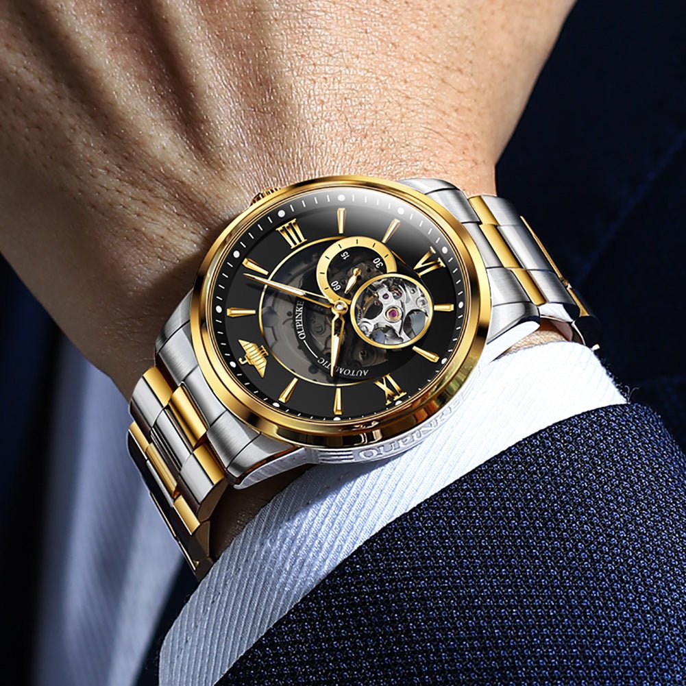 OUPINKE Hollow Time 3190 gold black skeleton dial watch worn on wrist